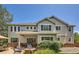 Large backyard with patio, fire pit, and mature landscaping at 13901 Quail Ridge Dr, Broomfield, CO 80020