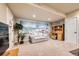 Finished basement features a tropical mural, desk, and comfortable seating at 13901 Quail Ridge Dr, Broomfield, CO 80020