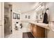 Bright bathroom features a tiled shower and vanity with updated fixtures at 13901 Quail Ridge Dr, Broomfield, CO 80020