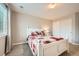 Cozy bedroom with carpet, natural light, and white trim, perfect for relaxation at 13901 Quail Ridge Dr, Broomfield, CO 80020