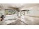 Spacious three car garage with painted walls and ample storage space at 13901 Quail Ridge Dr, Broomfield, CO 80020