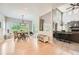 Bright living space features a casual dining area and an adjoined Gathering room with high ceilings at 13901 Quail Ridge Dr, Broomfield, CO 80020