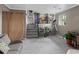 Spacious basement with access to the upper level and ample space for activities at 8764 W 95Th Ave, Broomfield, CO 80021