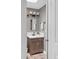 A stylish half bathroom featuring modern fixtures and a sleek vanity at 8764 W 95Th Ave, Broomfield, CO 80021