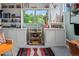 Bright home office boasts natural light, built-in shelving and a comfortable workspace at 8764 W 95Th Ave, Broomfield, CO 80021