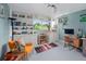 Bright home office boasts natural light, comfortable seating and plenty of storage at 8764 W 95Th Ave, Broomfield, CO 80021