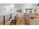 Living room with hardwood floors, fireplace, and comfortable seating at 1746 Shavano St, Longmont, CO 80504