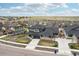 Aerial view of this home in a well-planned community with mountain views in the distance at 17843 W 93Rd Pl, Arvada, CO 80007