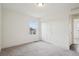 Bright, carpeted bedroom with closet; ample natural light, offering flexibility and comfort at 17843 W 93Rd Pl, Arvada, CO 80007