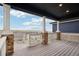 Enjoy outdoor living on this spacious deck with decorative pillars and panoramic neighborhood views at 17843 W 93Rd Pl, Arvada, CO 80007