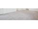 Bright bedroom featuring neutral walls, fresh trim, and clean, neutral carpeting at 17843 W 93Rd Pl, Arvada, CO 80007