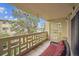 Charming balcony with decorative concrete railing, seating, and lovely neighborhood views at 580 S Clinton St # 12C, Denver, CO 80247