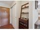 Welcoming entryway with storage options and hardwood flooring at 580 S Clinton St # 12C, Denver, CO 80247