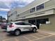 Community patrol vehicle parked near the fitness center and community response entrance at Windsor Gardens at 580 S Clinton St # 12C, Denver, CO 80247
