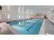 Bright indoor pool with multiple windows, providing ample natural light and a clean, modern design at 580 S Clinton St # 12C, Denver, CO 80247