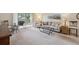Bright living room with sliding glass doors to a private balcony at 580 S Clinton St # 12C, Denver, CO 80247