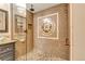 Modern bathroom with a stylish glass shower enclosure and updated fixtures at 2840 S Heather Gardens Way # A, Aurora, CO 80014