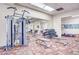 This gym provides free weights, weight machines, benches, mirrors and a carpeted floor at 2840 S Heather Gardens Way # A, Aurora, CO 80014
