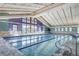 Indoor pool with clear water and natural light and ample space for swimming laps at 2840 S Heather Gardens Way # A, Aurora, CO 80014