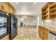 Bright kitchen showcasing custom cabinets, and stainless steel appliances at 2840 S Heather Gardens Way # A, Aurora, CO 80014