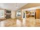 Inviting living room boasts a cozy fireplace, vaulted ceilings, and access to the kitchen at 2840 S Heather Gardens Way # A, Aurora, CO 80014