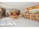 Spacious basement featuring a pool table, a lounge seating area, and a wet bar at 4880 Tall Horse Trl, Sedalia, CO 80135
