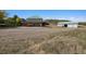 Exterior of home with a spacious garage and well-kept landscaping at 4880 Tall Horse Trl, Sedalia, CO 80135