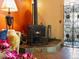 Cozy living room with a rustic fireplace, decorative accents, and warm lighting at 109 Bear Creek Ln, Morrison, CO 80465