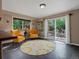 Inviting living space featuring comfortable seating and an open floor plan with access to the patio at 109 Bear Creek Ln, Morrison, CO 80465