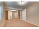Spacious basement with neutral carpeting, a full bathroom, and potential for flexible living space at 2792 S Ceylon St, Aurora, CO 80013