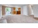 Open-concept living space that connects the living room with the kitchen with a sliding glass door at 2792 S Ceylon St, Aurora, CO 80013