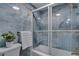 Beautiful bathroom with a glass shower, updated tile, and hardware at 4800 E Hale Pkwy # 712N, Denver, CO 80220