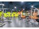 Modern gym fully equipped with treadmills, bikes, weightlifting machines, benches, and free weights at 4800 E Hale Pkwy # 712N, Denver, CO 80220