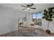 Bright home office with natural light and a contemporary ceiling fan at 4800 E Hale Pkwy # 712N, Denver, CO 80220
