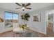 Home office with comfortable chair and great light at 4800 E Hale Pkwy # 712N, Denver, CO 80220