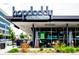 Modern restaurant exterior with inviting patio and the Hopdoddy Burger Bar sign at 4800 E Hale Pkwy # 712N, Denver, CO 80220