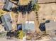 Aerial view of a home with a large yard, showcasing the neighborhood and surrounding trees on a sunny day at 7744 S Gaylord Way, Centennial, CO 80122