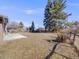 Expansive backyard showcasing mature trees and ample open space, perfect for outdoor activities at 7744 S Gaylord Way, Centennial, CO 80122