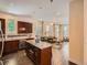 Open kitchen showcases granite countertops, stainless appliances, and a breakfast bar at 2775 California St, Denver, CO 80205