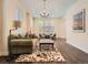 Inviting living room with hardwood floors, area rug, recessed lighting, and many windows at 2775 California St, Denver, CO 80205