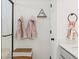 Bathroom featuring a shower, door, shelving and decorations at 1039 Highview Dr, Erie, CO 80516