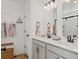 Bathroom with double vanity, modern fixtures, and a glass-enclosed shower at 1039 Highview Dr, Erie, CO 80516