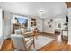 Inviting living room with an open layout and hardwood floors at 4455 Brentwood St, Wheat Ridge, CO 80033