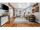 Bright living room features hardwood floors, stylish furniture, and plenty of natural light at 4455 Brentwood St, Wheat Ridge, CO 80033