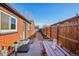 Cozy backyard with a patio and wood fence at 3324 N Glencoe St, Denver, CO 80207