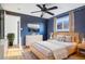 Charming bedroom with hardwood floors and a light color palette at 3324 N Glencoe St, Denver, CO 80207