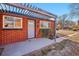 Home exterior with covered entryway and pergola at 3324 N Glencoe St, Denver, CO 80207