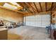 Spacious garage interior with overhead storage and room for two bicycles at 3324 N Glencoe St, Denver, CO 80207