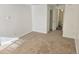 Spacious bedroom with neutral carpeting and closet at 14751 E Tennessee Dr # 226, Aurora, CO 80012