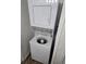 Stackable washer and dryer in a closet at 14751 E Tennessee Dr # 226, Aurora, CO 80012